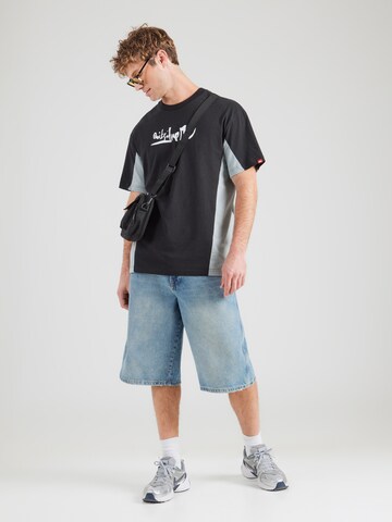 QUIKSILVER Λειτουργικό μπλουζάκι σε μαύρο