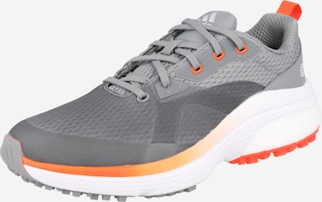 adidas Golf Спортни обувки в сиво: отпред