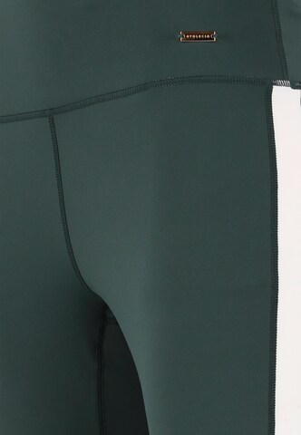 Athlecia Skinny Sports trousers 'Aspasia' in Green