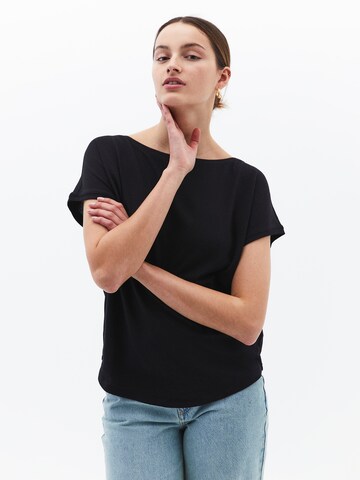 Maglietta di OXXO in nero