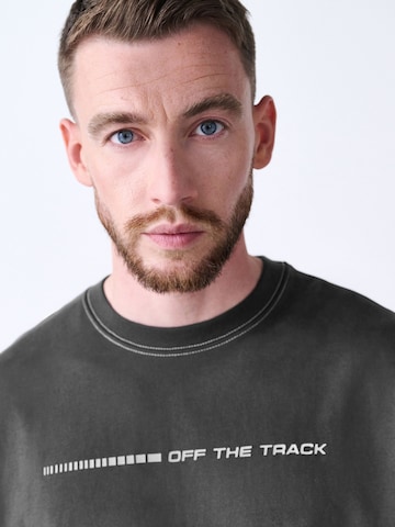 T-Shirt Next en gris