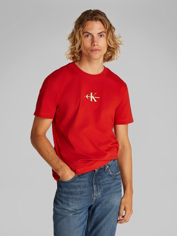 Regular T-Shirt Calvin Klein Jeans en rouge : devant