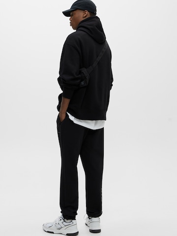 Pull&Bear Tapered Byxa i svart