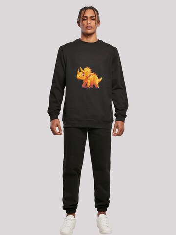 Sweat-shirt 'Süßer Triceratops Dinosaurier' F4NT4STIC en noir