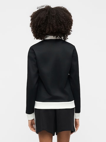 ADIDAS ORIGINALS Collegetakki 'Classic' värissä musta