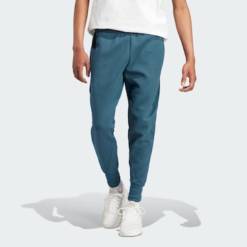 Effilé Pantalon de sport 'Z.N.E. Premium' ADIDAS SPORTSWEAR en bleu : devant