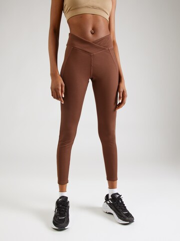 Reebok Skinny Sportbroek 'STUDIO' in Bruin: voorkant