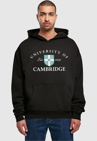 Merchcode - Sudadera 'University Of Cambridge - Est 1209' en negro: frente