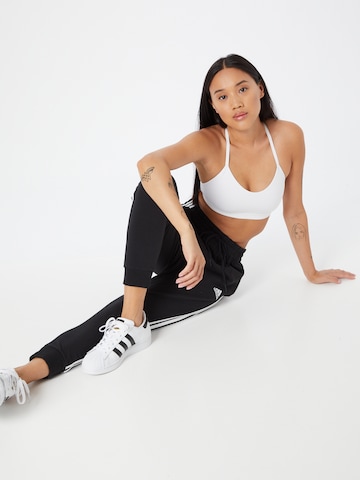 ADIDAS SPORTSWEAR Tapered Workout Pants 'Essentials 3-Stripes' in Black