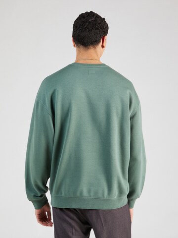 LEVI'S ® Sweatshirt 'Relaxd Graphic Crew' in Grün