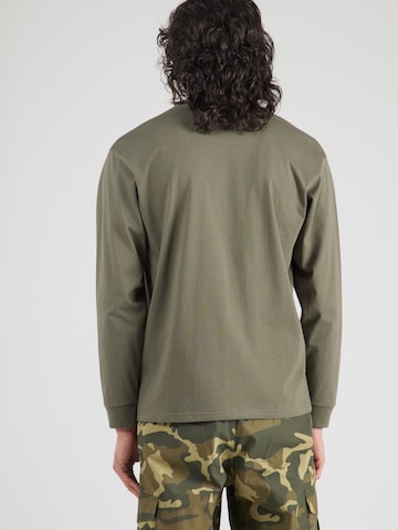 Carhartt WIP T-shirt 'Chase' i grön