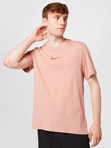NIKE Functioneel shirt 'Burnout' in Roze: voorkant