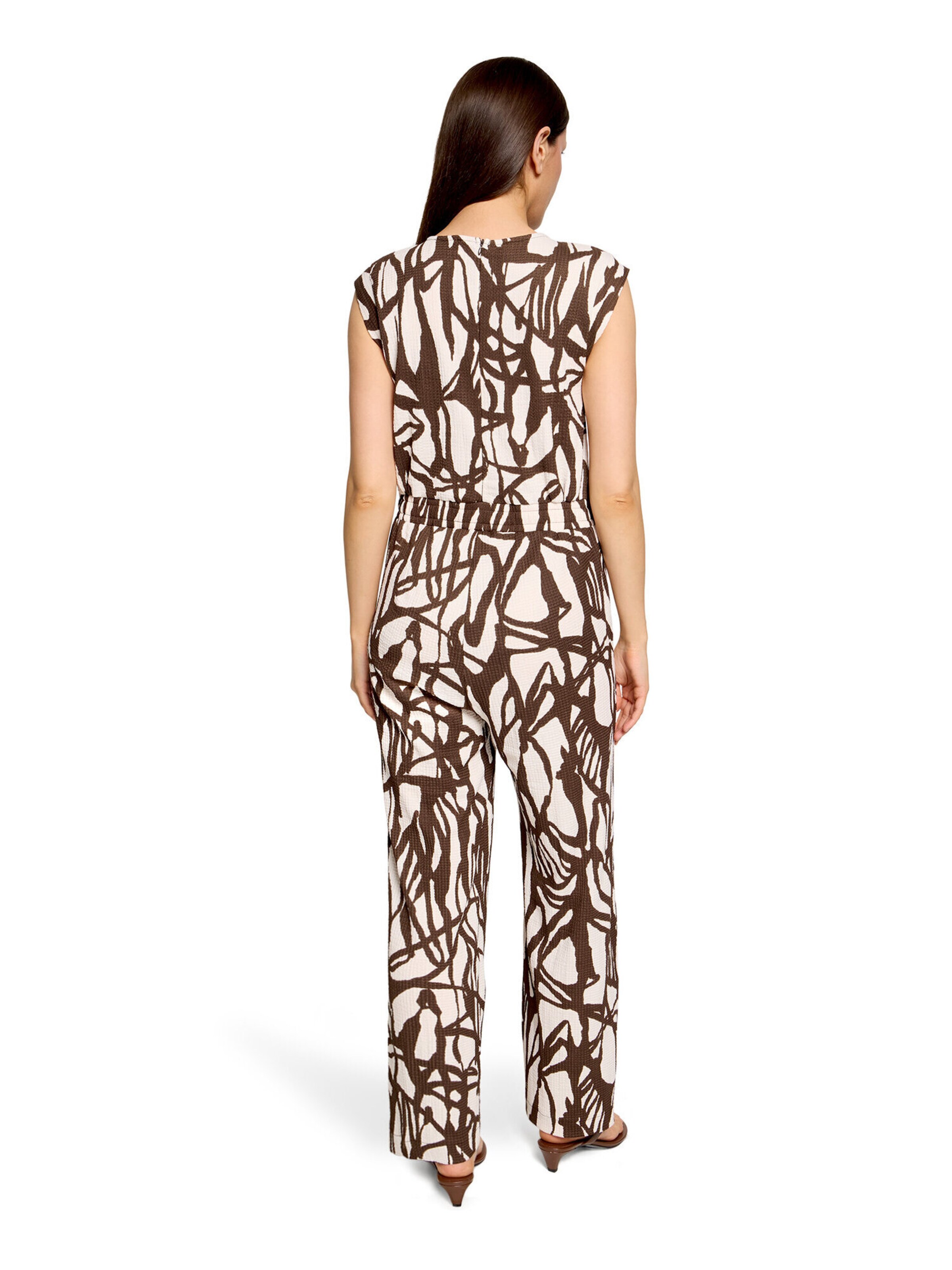 Cartoon Jumpsuit in Beige