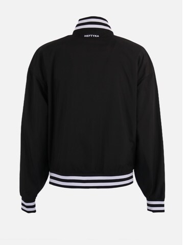 HEFTYKA Übergangsjacke‌‌‌ in Schwarz