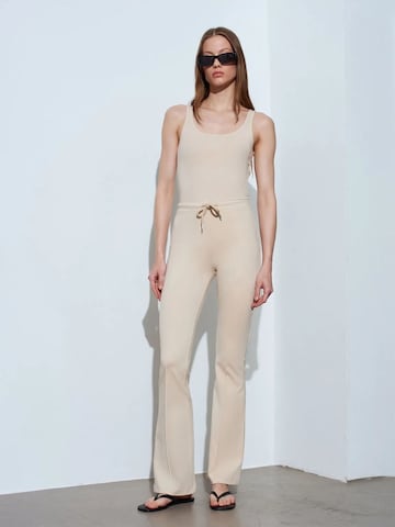 Top di Dilvin in beige