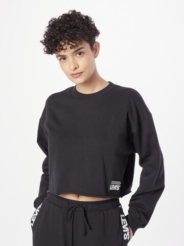 LEVI'S ® Sweatshirt 'GR Carla Raw Cut Crew' in Black: front