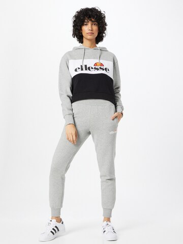 ELLESSE Tapered Trousers 'Hallouli' in Grey