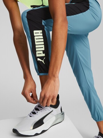 PUMA Tapered Sportbroek in Blauw