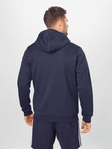 ADIDAS SPORTSWEAR - Skinny Sudadera con cremallera deportiva 'Essentials' en azul