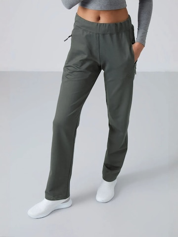 Regular Pantalon de sport Tommy Life en vert : devant