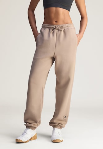 ADIDAS BY STELLA MCCARTNEY - Tapered Pantalón deportivo 'Loose Sweat' en marrón