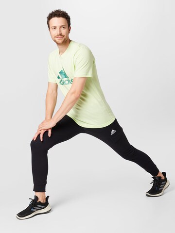 ADIDAS SPORTSWEAR Дънки Tapered Leg Спортен панталон 'Essentials Fleece' в черно