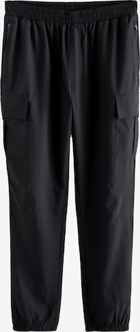 Next Tapered Urheiluhousut värissä musta: etupuoli