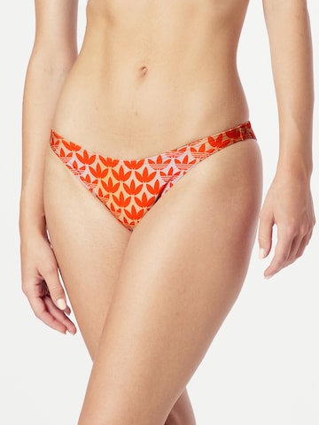 ADIDAS ORIGINALS - Braga de bikini 'Monogram' en naranja: frente