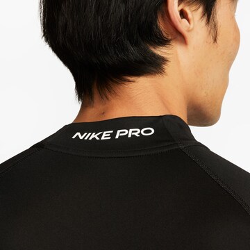 NIKE Λειτουργικό μπλουζάκι 'Pro' σε μαύρο