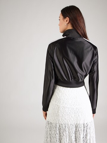 PUMA Sportovní bunda 'Future T7' – černá