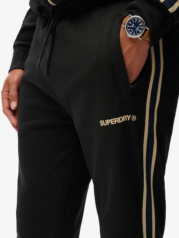 Superdry Tapered Παντελόνι 'Tech Cult' σε μαύρο
