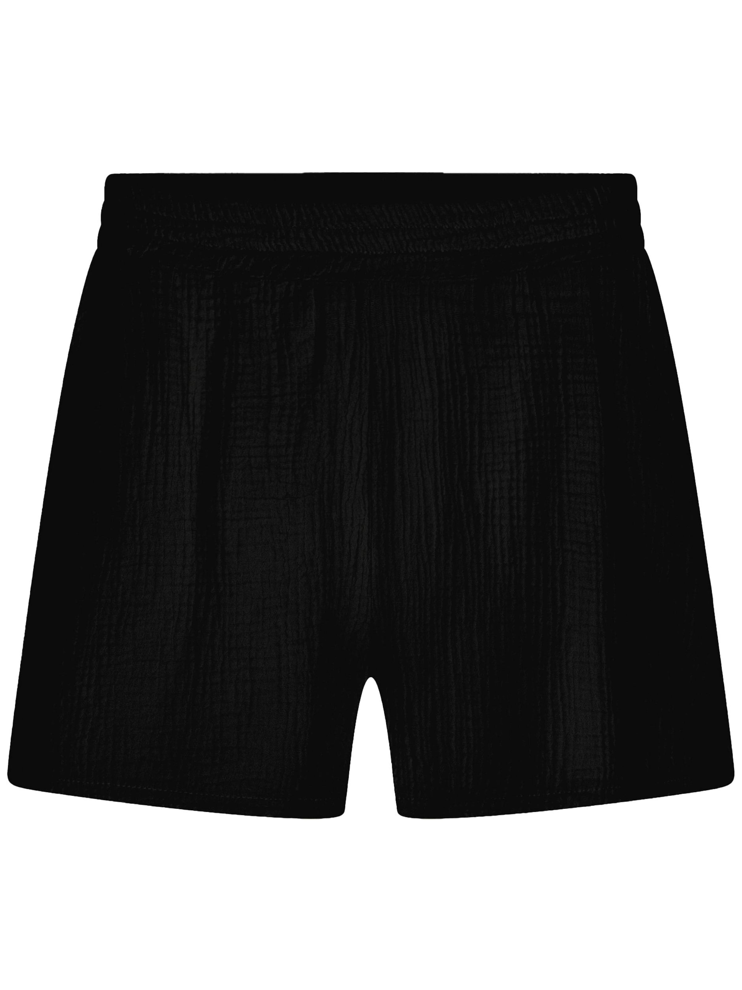 SASSYCLASSY Regular Pants in Black: front