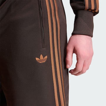 ADIDAS ORIGINALS Regular Trousers 'Firebird' in Brown