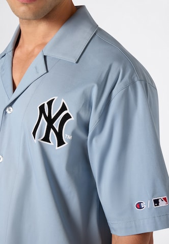 Champion - Ajuste confortable Camisa en azul
