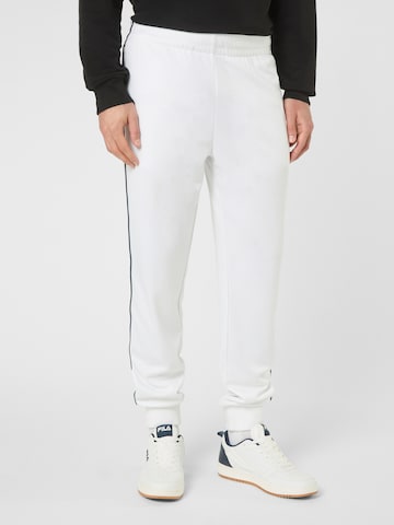 FILA Regular Housut 'SAGANO regular track pants' värissä valkoinen: etupuoli