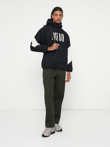 Nike Sportswear Přechodná bunda 'AIR' – černá