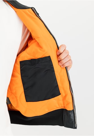 ALPHA INDUSTRIES Tussenjas 'Cwu Fl Mod' in Zwart