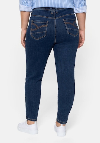 SHEEGO Slimfit Jeans i blå