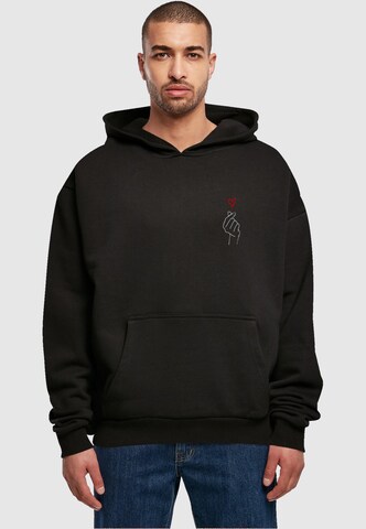 Merchcode Sweatshirt 'K Heart' in Zwart: voorkant
