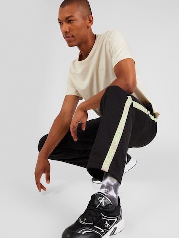 Calvin Klein Jeans Voľný strih Nohavice - Čierna