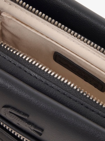 LACOSTE Skuldertaske 'Celys' i sort