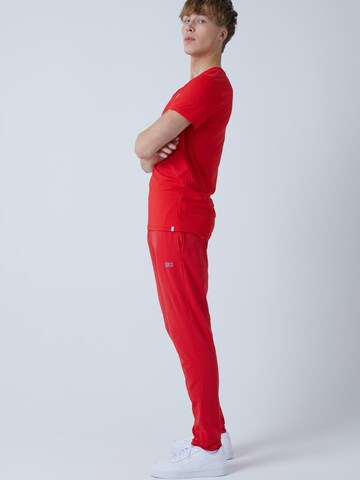 Coupe slim Pantalon de sport 'Slim Training Pants' SPORTKIND en rouge