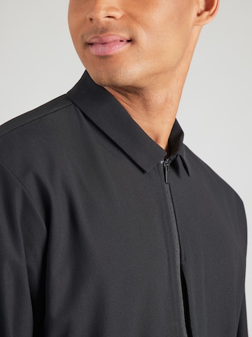 NIKE Urheilutakki värissä musta