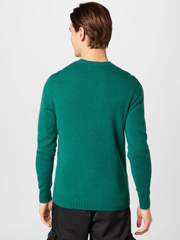 LEVI'S ® Neulepaita 'Original Housemark Sweater' värissä vihreä