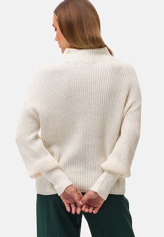 Pullover di zero in beige