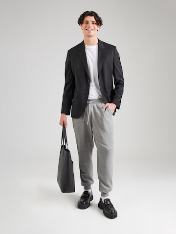 TOMMY HILFIGER Tapered Παντελόνι 'ESSENTIAL' σε γκρι