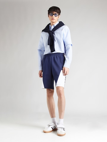 Champion Authentic Athletic Apparel Loosefit Nadrág - kék