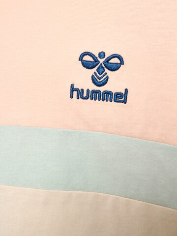 T-Shirt fonctionnel Hummel en rose