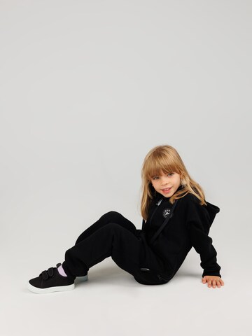 MANUL Overall 'Panther by MANUL – Smart BackZip' in Schwarz