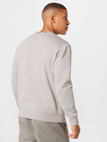 Champion Authentic Athletic Apparel Sweatshirt in Grau